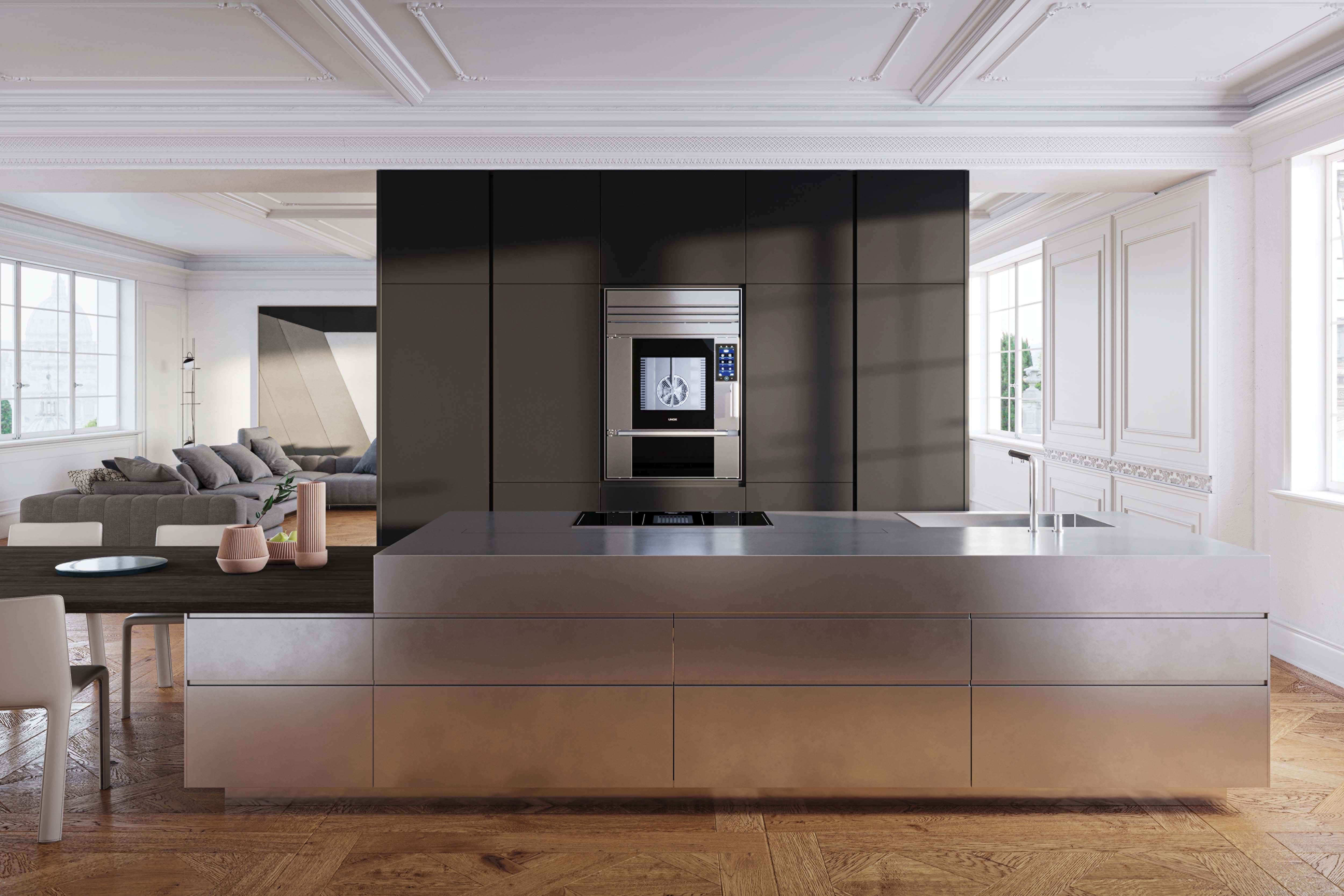 Model 1S beautifully integrated in an elegant black residential kitchen in Paris